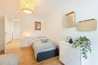 Ein Bett oder Betten in einem Zimmer der Unterkunft Central Alpine Stay - Modern & Free Parking