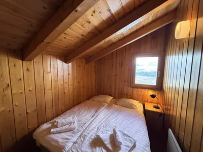 Ein Bett oder Betten in einem Zimmer der Unterkunft Fontannets 001 COSY & MOUNTAIN chalet 10 pers