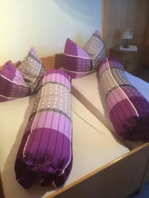 Ein Bett oder Betten in einem Zimmer der Unterkunft Restaurant Felsenburg