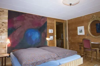 Ein Bett oder Betten in einem Zimmer der Unterkunft Chalet Cresta di Saas