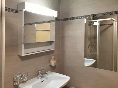 Ein Badezimmer in der Unterkunft Waldrain 2