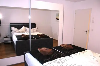 Ein Bett oder Betten in einem Zimmer der Unterkunft Brig City Apartment
