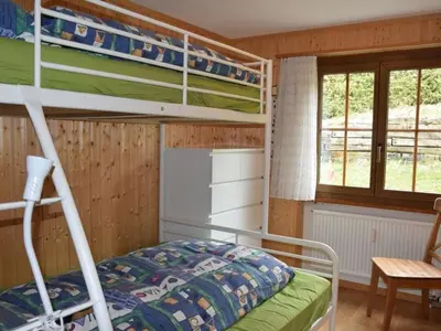 Ein Bett oder Betten in einem Zimmer der Unterkunft Apartment Brandegg 4 by Interhome