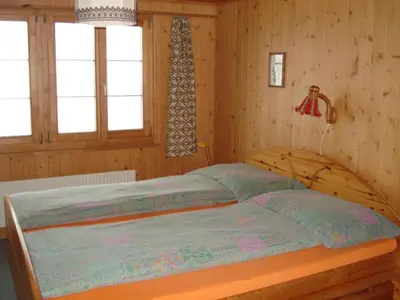 Ein Bett oder Betten in einem Zimmer der Unterkunft Apartment Bauernhaus Uf dr Flue by Interhome