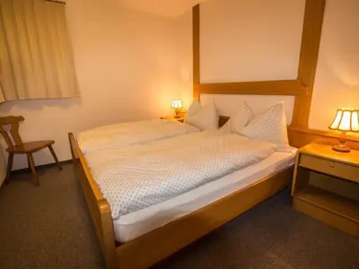 Ein Bett oder Betten in einem Zimmer der Unterkunft Apartment Rustica 4 by Interhome