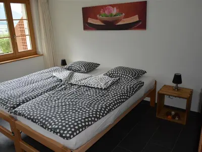 Ein Bett oder Betten in einem Zimmer der Unterkunft Apartment Bijou Eggetli by Interhome