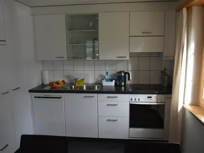 Küche/Küchenzeile in der Unterkunft Apartment Bijou Eggetli by Interhome