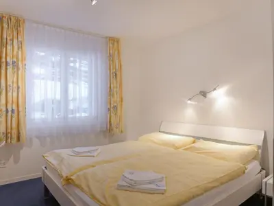 Ein Bett oder Betten in einem Zimmer der Unterkunft Apartment Goldenhorn Apt-F by Interhome