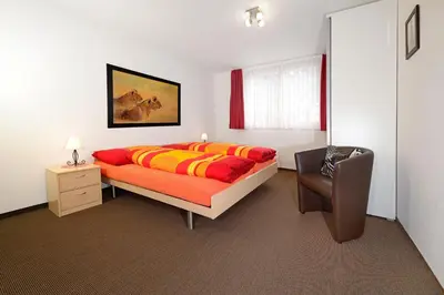 Ein Bett oder Betten in einem Zimmer der Unterkunft Ferienwohnung Haus Achilles