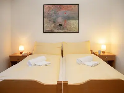 Ein Bett oder Betten in einem Zimmer der Unterkunft Apartment Primula Apt- B by Interhome