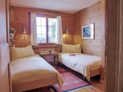 Ein Bett oder Betten in einem Zimmer der Unterkunft Chalet Wätterlücke by Interhome