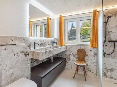 Ein Badezimmer in der Unterkunft Chalet Mioche by Interhome