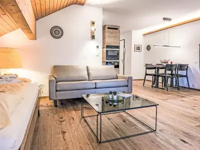 Ein Sitzbereich in der Unterkunft Apartment Eiger Residence Apt-A-425 by Interhome