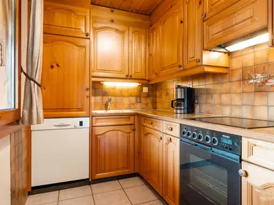 Küche/Küchenzeile in der Unterkunft Chalet Als man zählte 1989 by Interhome