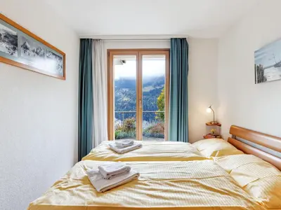 Ein Bett oder Betten in einem Zimmer der Unterkunft Apartment Silberhorn Apt- V by Interhome