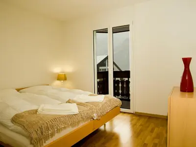 Ein Bett oder Betten in einem Zimmer der Unterkunft Apartment A31 by Interhome
