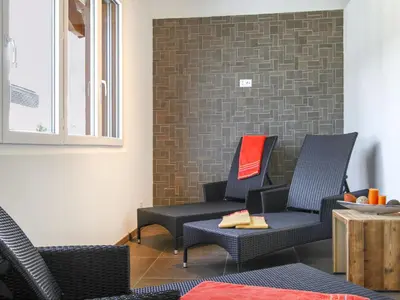 Ein Sitzbereich in der Unterkunft Studio A01 by Interhome