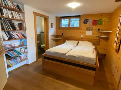 Ein Bett oder Betten in einem Zimmer der Unterkunft La Clé des Champs