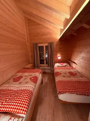 Ein Bett oder Betten in einem Zimmer der Unterkunft Staubbachbänkli