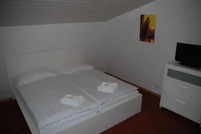 Ein Bett oder Betten in einem Zimmer der Unterkunft Family-Apartment Du Lac