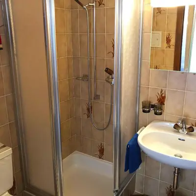 Ein Badezimmer in der Unterkunft Haus Erle