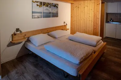 Ein Bett oder Betten in einem Zimmer der Unterkunft Hotel Restaurant Simplon
