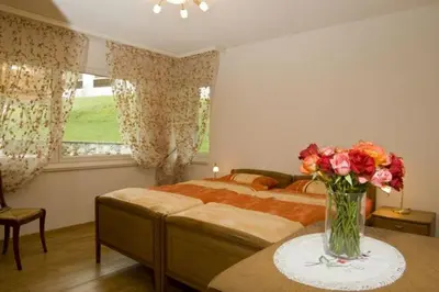 Ein Bett oder Betten in einem Zimmer der Unterkunft Residenz Ambassador