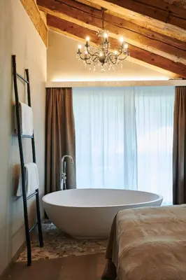 Ein Bett oder Betten in einem Zimmer der Unterkunft Matthiol Boutique Hotel