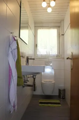 Ein Badezimmer in der Unterkunft Haus Weideli, Dammstrasse 7