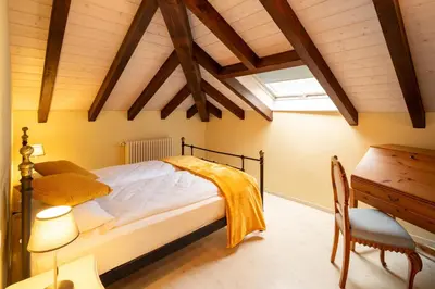 Ein Bett oder Betten in einem Zimmer der Unterkunft Locanda Villa d' Epoca