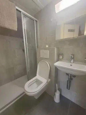 Ein Badezimmer in der Unterkunft Les loulou 2