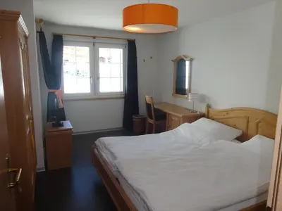 Ein Bett oder Betten in einem Zimmer der Unterkunft Apartment Edelweiss