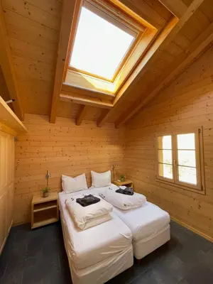 Ein Bett oder Betten in einem Zimmer der Unterkunft Haus Sapporo