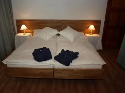 Ein Bett oder Betten in einem Zimmer der Unterkunft Chalet Huwi Zermatt