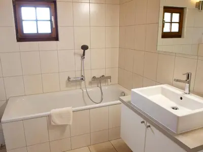 Ein Badezimmer in der Unterkunft Chalet Huwi Zermatt