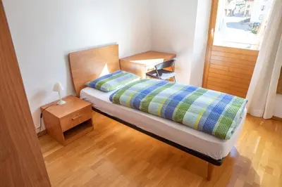 Ein Bett oder Betten in einem Zimmer der Unterkunft BB Garni Motta