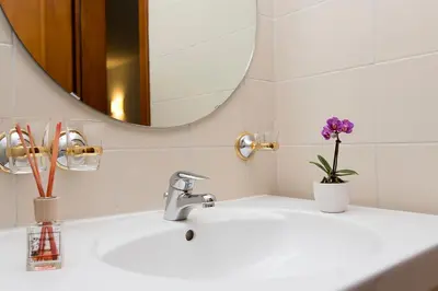 Ein Badezimmer in der Unterkunft Hotel Ristorante Walser