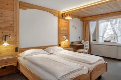 Ein Bett oder Betten in einem Zimmer der Unterkunft Hotel Antika