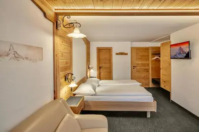 Ein Bett oder Betten in einem Zimmer der Unterkunft Hotel Antika