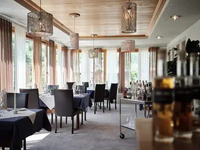 Ein Restaurant oder anderes Speiselokal in der Unterkunft Hotel Hubertus