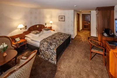 Ein Bett oder Betten in einem Zimmer der Unterkunft Hotel Sonne
