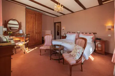 Ein Bett oder Betten in einem Zimmer der Unterkunft Hotel Regina