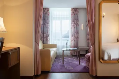 Ein Bett oder Betten in einem Zimmer der Unterkunft Seiler au Lac
