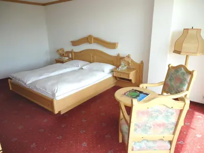 Ein Bett oder Betten in einem Zimmer der Unterkunft Grand Hôtel du Parc