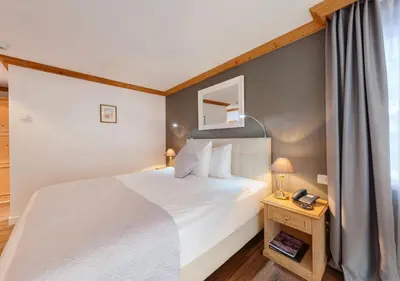 Ein Bett oder Betten in einem Zimmer der Unterkunft Hotel Albatros