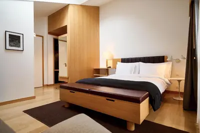Ein Bett oder Betten in einem Zimmer der Unterkunft The Omnia