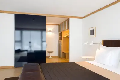 Ein Bett oder Betten in einem Zimmer der Unterkunft The Omnia