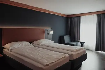 Ein Bett oder Betten in einem Zimmer der Unterkunft Hotel Alpin Superior