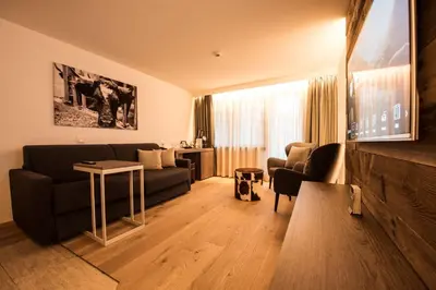 Ein Sitzbereich in der Unterkunft Hotel Daniela