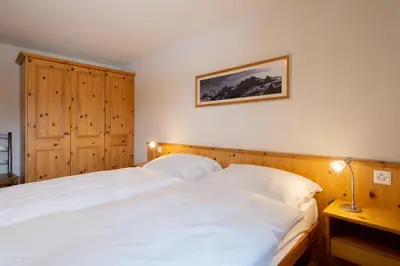 Ein Bett oder Betten in einem Zimmer der Unterkunft Haus Zer Weidu